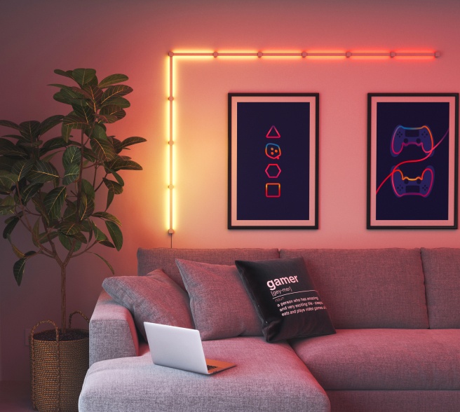 Office bedroom setup with Nanoleaf Lines RGB lights mounted above the desk and monitor. The perfect gaming lights for your PC battlestation.