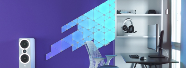 Office bedroom setup with Nanoleaf Lines RGB lights mounted above the desk and monitor. The perfect gaming lights for your PC battlestation.